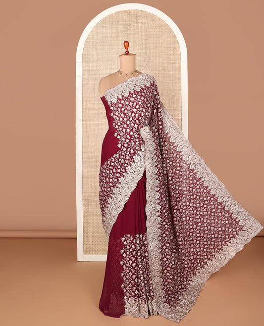 Maroon half-&-half-style floral vine thread embroidered designer saree, scallop embroidered border