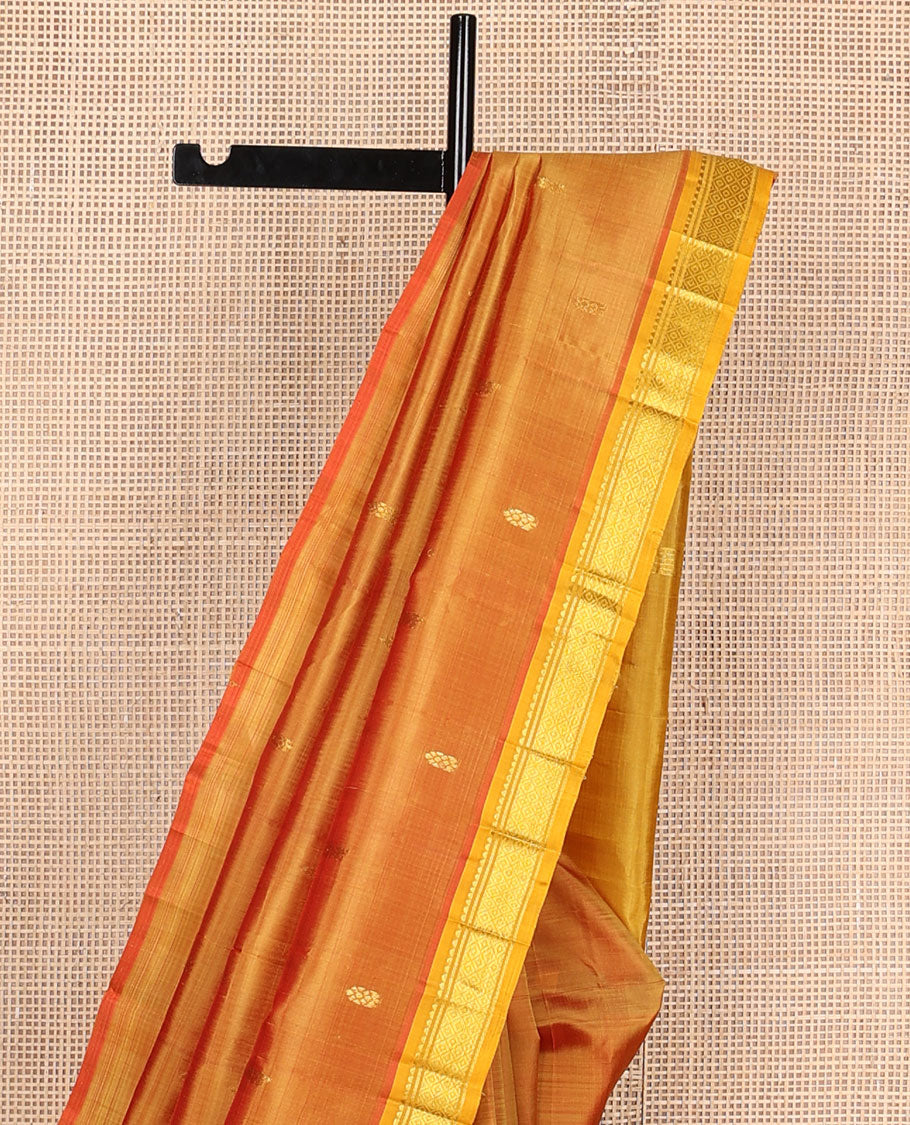 Orange zari buttas kanchipuram silksaree, contrast one-sided border of rekku,banaras & mayil kann designs & zari design pallu