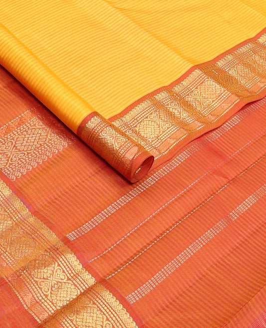 Yellow vazhaipoo striped & zari buttas silk saree, contrast border of manga mokku,muthu,chakram, jada nagam & kili & zari design pallu