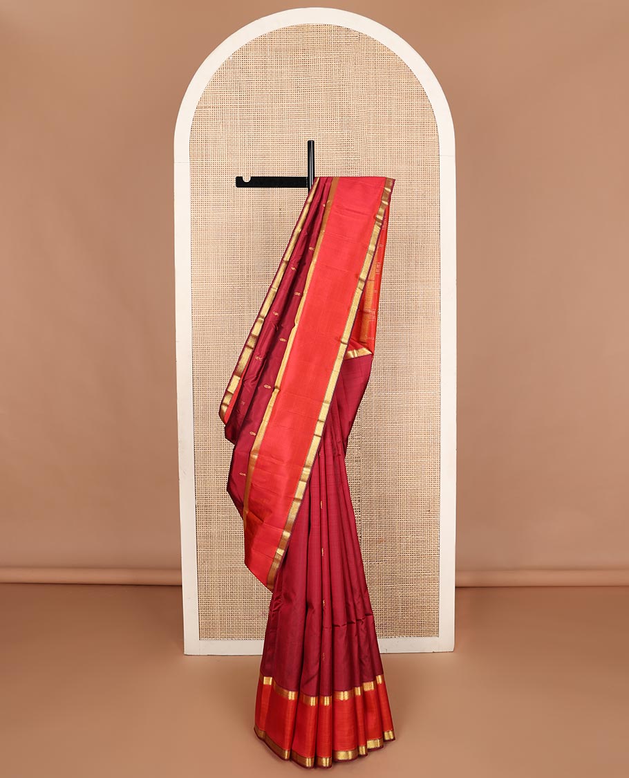 Maroon zari buttas Kanchipuram silk saree,  contrast rettai pettu zari border of muthu designs, and zari design pallu