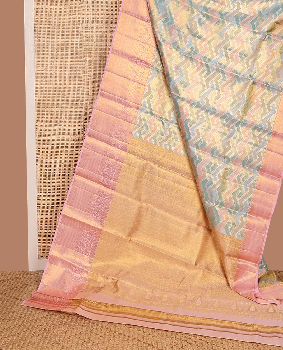 Blue Kanchipuram Tissue Silk Saree, Richly Detailed with Jacquard Design on Its Body, Complemented by a Contrast Border of Traditional Designs in Zari, Pallu Steeped with Poun Designs, and Paired with a Contrast Blouse