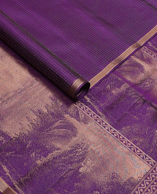 Purple zari micro-checked soft silk saree, piping zari border & pallu accentuated with natural scenery designs