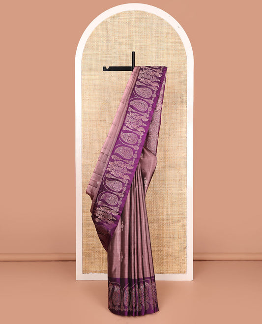 Brown buttas soft silk saree, contrast border of paisley and peacock designs, and pallu of intricate designs