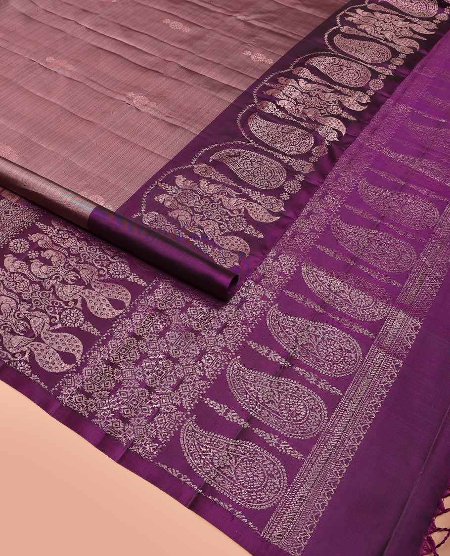 Brown buttas soft silk saree, contrast border of paisley and peacock designs, and pallu of intricate designs