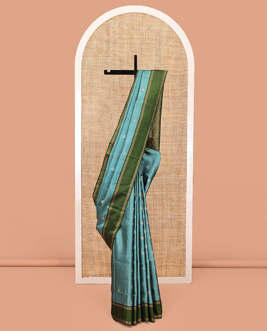 Blue Mayuri Soft Silk Saree, Woven with Buttas All Over the Body, Complemented by a Contrast Striped Border, Pallu of Diagonally Stripes, and Paired with a Contrast Blouse