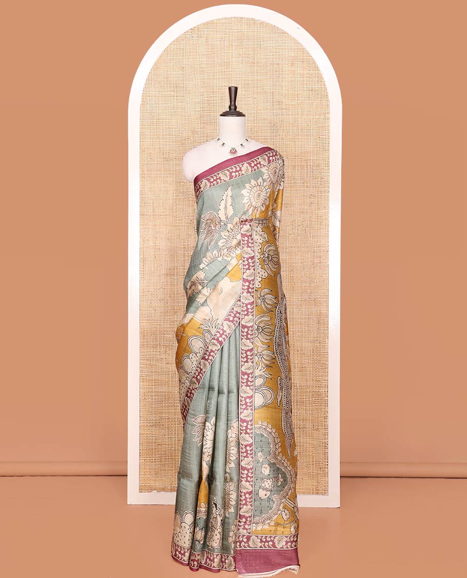 Grey Printed Silk Saree Decked Up with Floral and Ancient Human Motifs Print, Complemented with a Contrast Printed Border, Pallu Beautifully Printed with Lord Krishna and Radha Figurines, and Paired with a Contrast Printed Blouse