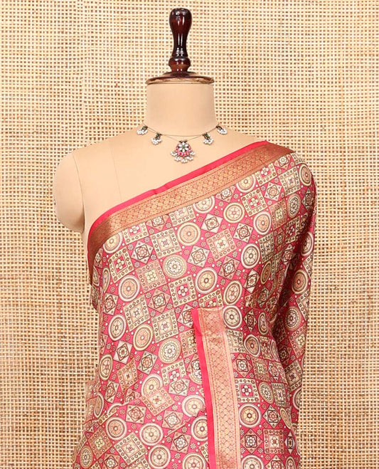 Pink Printed Silk Saree, Gracefully Embellished with Geometric Prints, Highlighted by a Traditional Zari Border, Printed Pallu, and a Matching Blouse