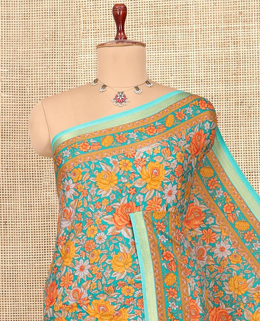 Blue Printed Silk Saree, Accentuated with Floral Print, a Traditional Zari Border, Floral Pallu, and a Matching Blouse