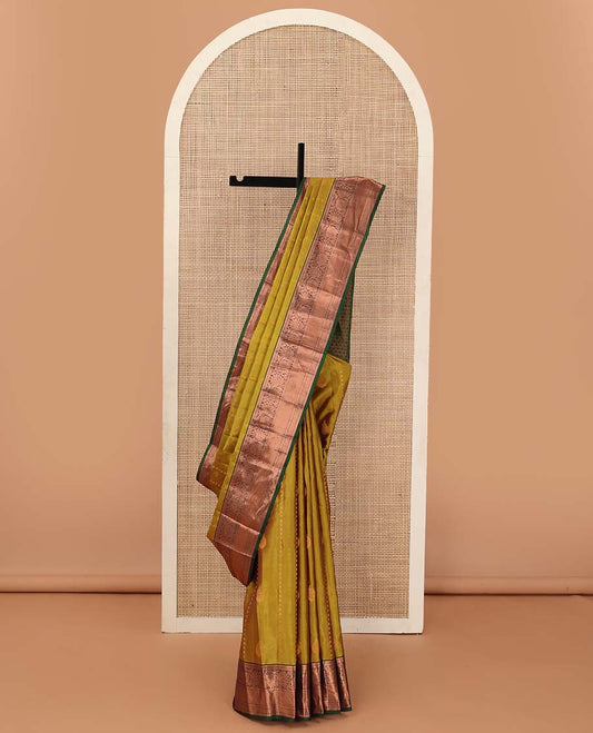 Green zari design Vasundhara silk mix saree, contrast border of rekku, muthu, neli, and kodi visiry design, and ogee patterned pallu