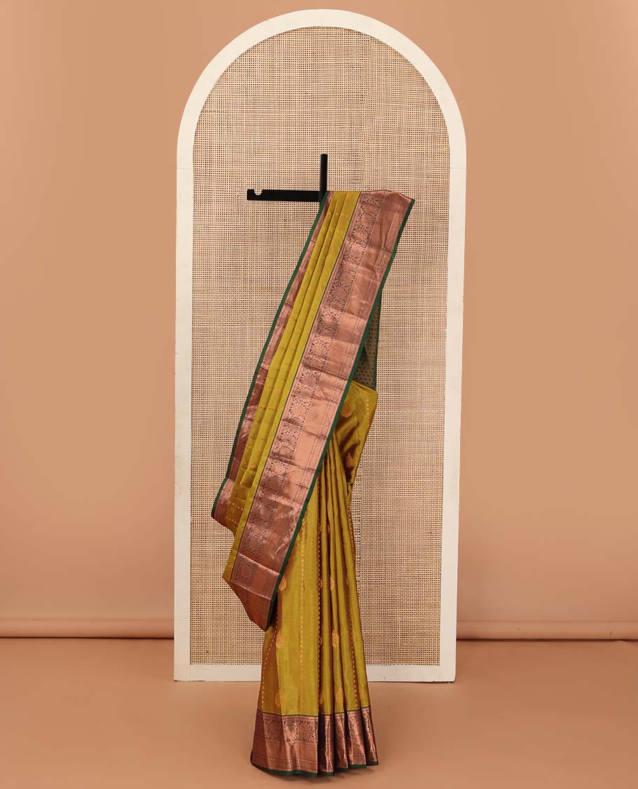 Green zari design Vasundhara silk mix saree, contrast border of rekku, muthu, neli, and kodi visiry design, and ogee patterned pallu