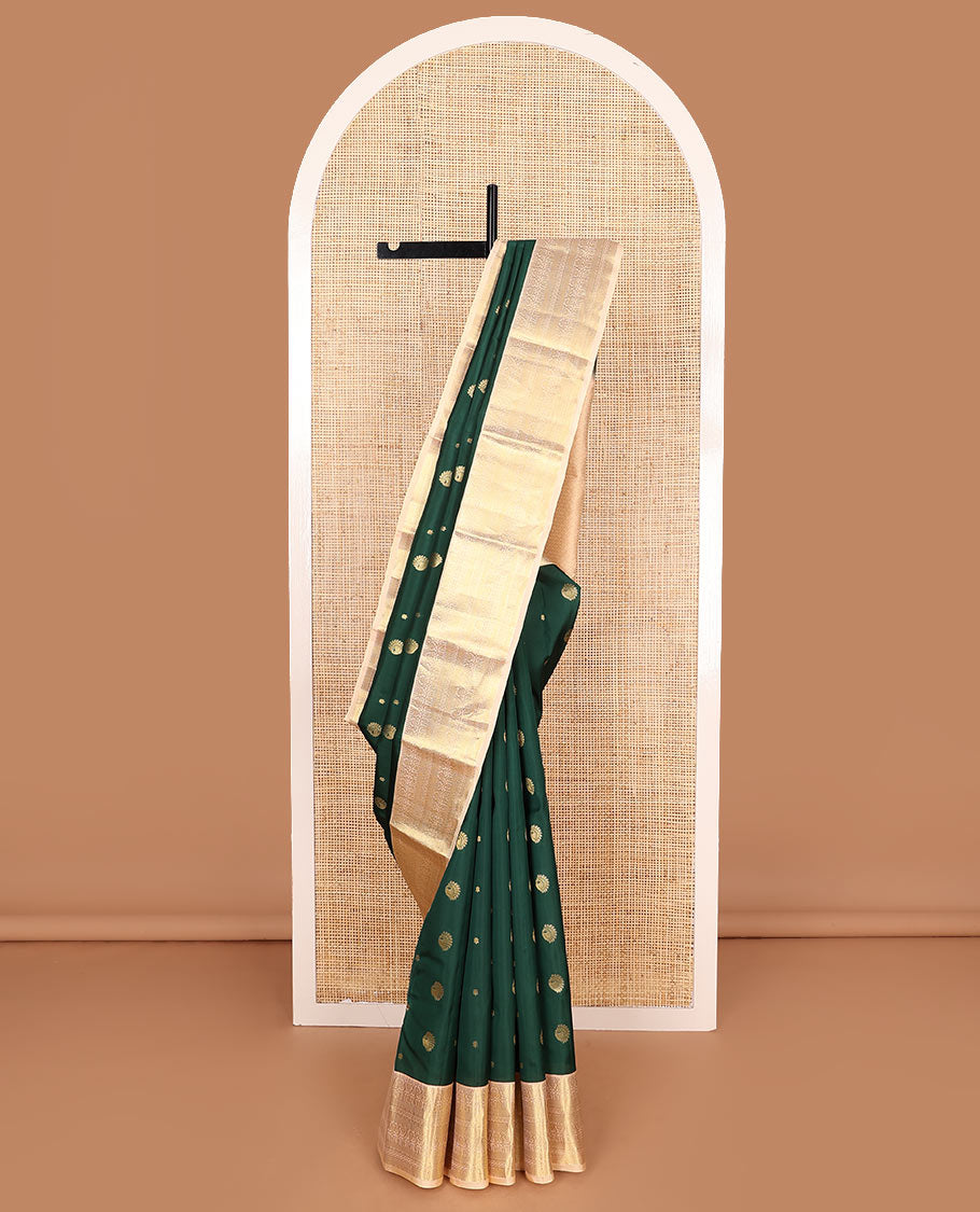 Green Vasundhara Lite Silk Mix Saree Spotlighted with Zari Buttas, Complemented by a Contrast Border Depicting Paneer Sombu, Muthu, Dhavana Kodi, Mayil Kann, Neli, and Lavangam Designs, Featuring a Zari-Elevated Jaal Pallu, Paired with a Contrast Blouse
