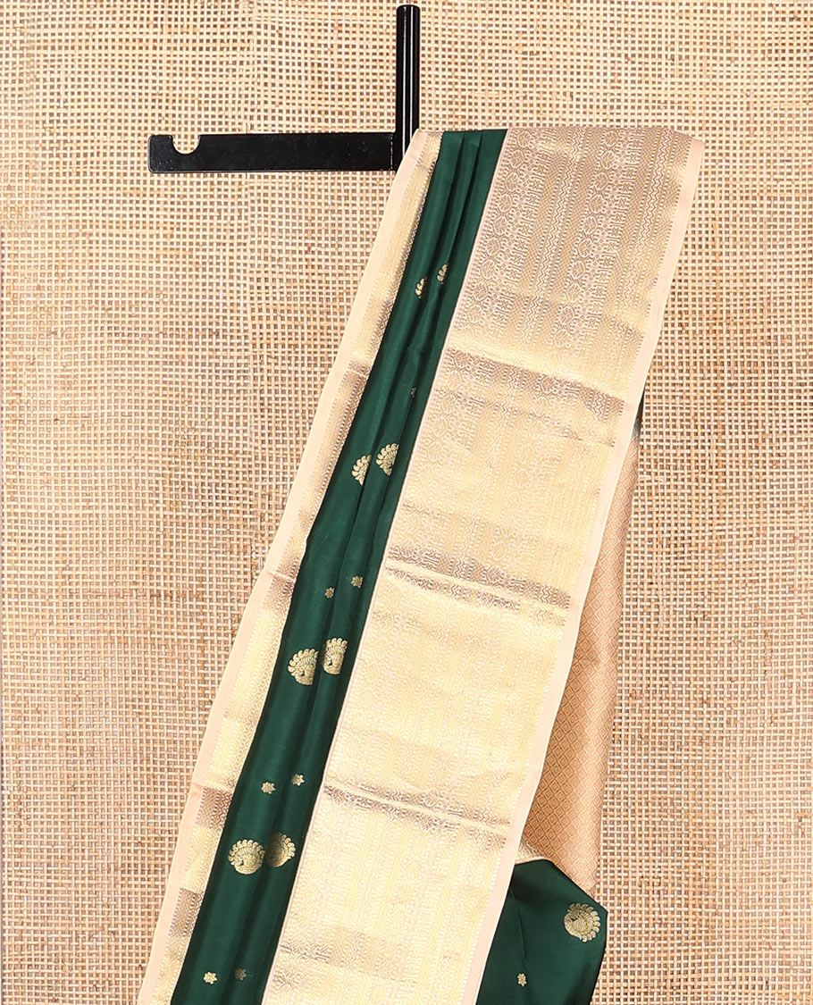 Green Vasundhara Lite Silk Mix Saree Spotlighted with Zari Buttas, Complemented by a Contrast Border Depicting Paneer Sombu, Muthu, Dhavana Kodi, Mayil Kann, Neli, and Lavangam Designs, Featuring a Zari-Elevated Jaal Pallu, Paired with a Contrast Blouse