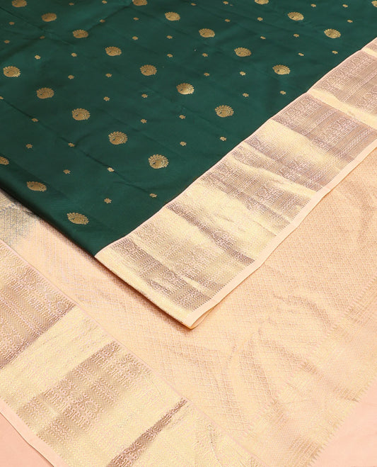 Green Vasundhara Lite Silk Mix Saree Spotlighted with Zari Buttas, Complemented by a Contrast Border Depicting Paneer Sombu, Muthu, Dhavana Kodi, Mayil Kann, Neli, and Lavangam Designs, Featuring a Zari-Elevated Jaal Pallu, Paired with a Contrast Blouse