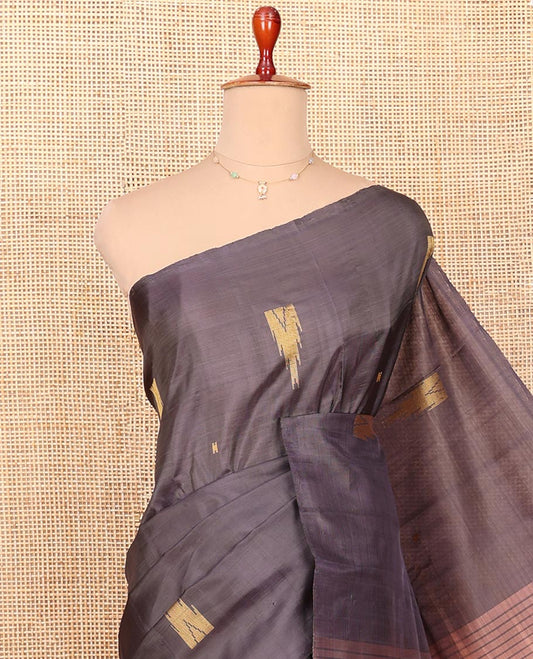 Borderless Black Banana Pith Saree Finely Woven with Temple Buttas, Complemented by a Contrasting Pallu Steeped with Buttas and Stripes, and Paired with a Contrast Plain Blouse