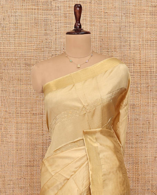 Sandal Banana Pith Saree, Subtly Sparkled with Buttas and Stripes All Over Its Body, Highlighted by Self-Border, Pallu of Zari Stripes, and Paired with a Matching Blouse