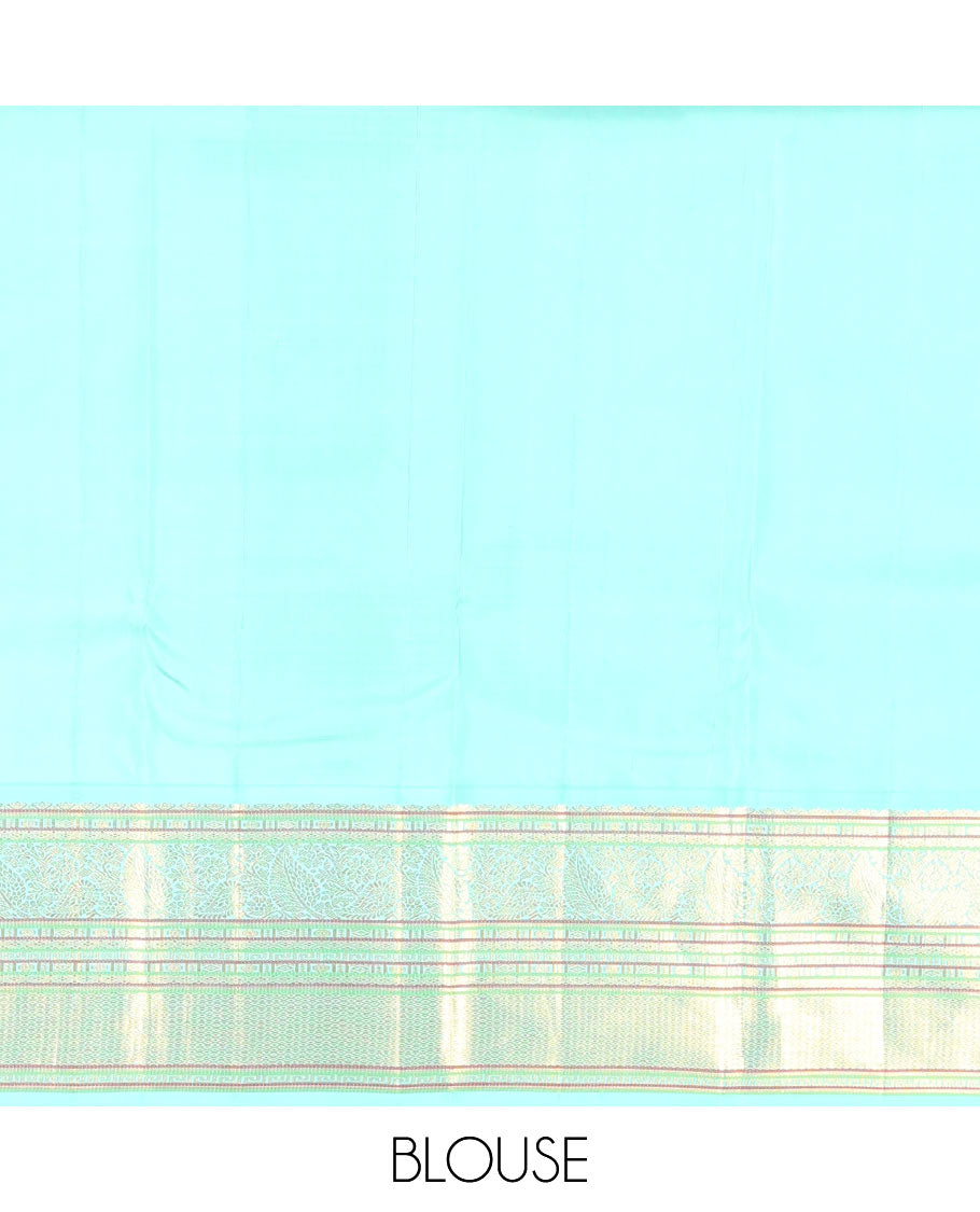 Yellow Vasundhara Silk Saree Decorated with Zari Buttas All Over Its Body, Complemented by a Contrast Border of Leaf, Rudraksham, Diamond, and Mayil Kann Designs, Pallu Featuring Manga Creeper Designs, and Paired with a Contrast Blouse