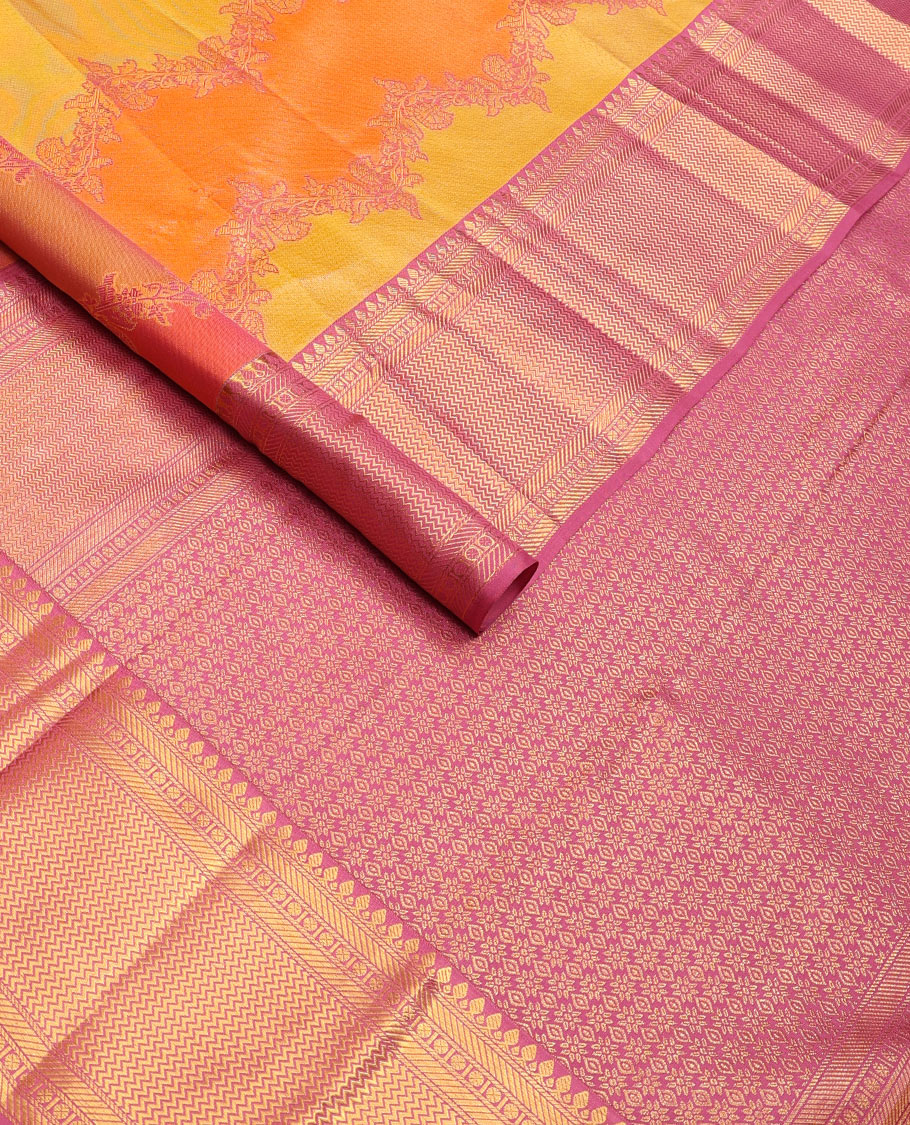 Yellow rangkat-style floral vine wedding silk saree, contrast border of thilakam mokku, banaras, rudraksham & vanki designs
