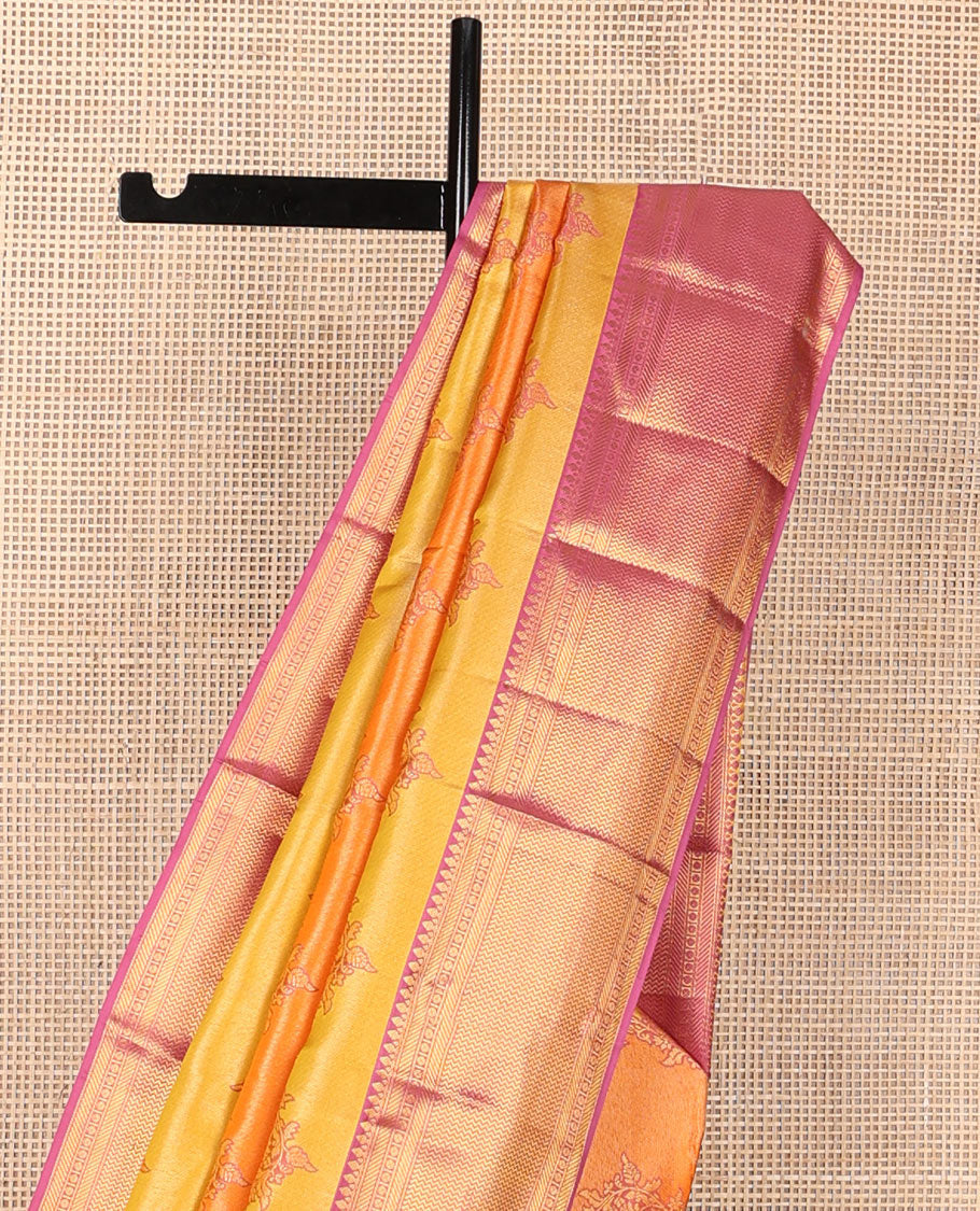 Yellow rangkat-style floral vine wedding silk saree, contrast border of thilakam mokku, banaras, rudraksham & vanki designs