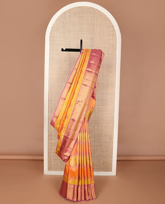 Yellow rangkat-style floral vine wedding silk saree, contrast border of thilakam mokku, banaras, rudraksham & vanki designs
