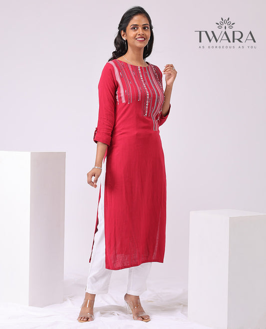 Twara red intricate embroidered round neck , 3/4 th sleeve , below knee leght straight cut kurti