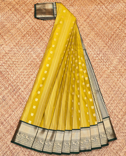 Green Budget Silk Saree, Finely Woven with Zari Buttas and Stripes All Over Its Body, Complemented by a Contrast Traditional Zari Design Border, Geometric-Patterns Pallu, and Paired with a Contrast Blouse