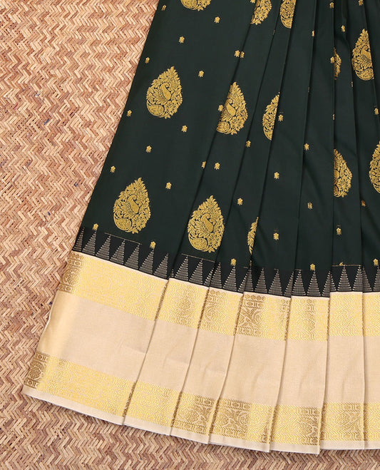Green Budget Silk Saree, Beautifully Bedecked with Zari Buttas All Over Its Body, Complemented by a Contrast Traditional Zari Design Rettai Pettu Temple Border, Sparsely Woven Pallu, and Paired with a Contrast Blouse