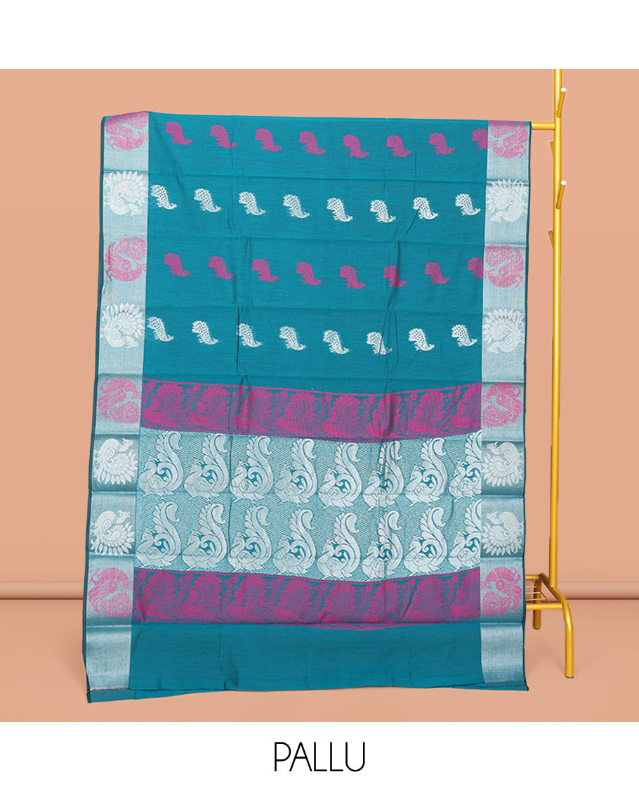 Blue Semi-Silk Cotton Saree, Beautified with Peacock Buttas All Over Its Body, Highlighted by a Zari Border of Peacocks, Pallu Woven with Peacock Designs, and Paired with a Matching Blouse