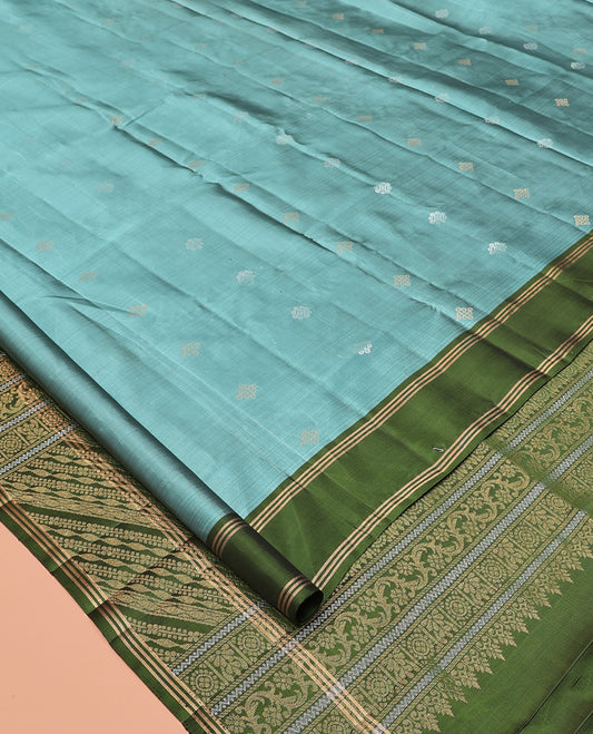 Blue Mayuri Soft Silk Saree, Woven with Buttas All Over the Body, Complemented by a Contrast Striped Border, Pallu of Diagonally Stripes, and Paired with a Contrast Blouse
