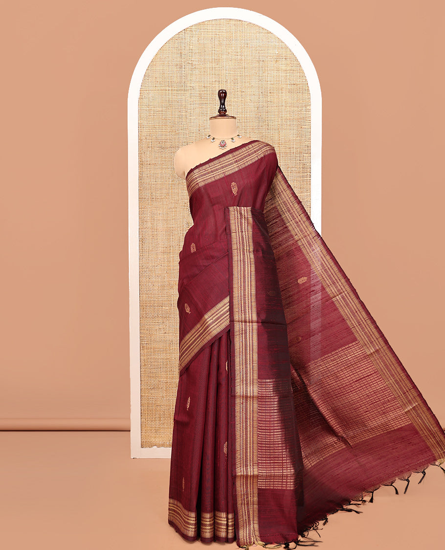 Maroon Dupion Silk Saree, Ornamented with Buttas, a Traditional Border, Striped Pallu, and a Matching Blouse