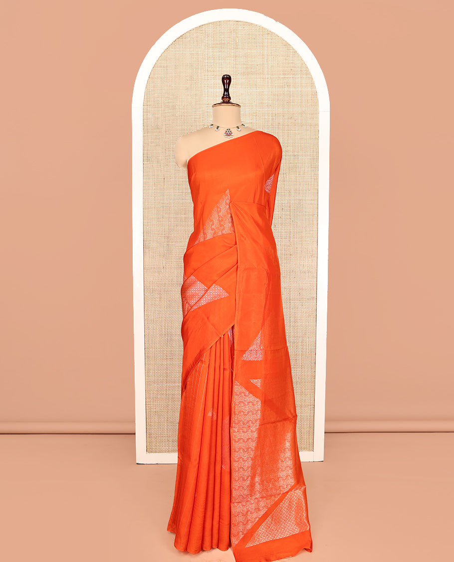 Borderless Orange Chanderi Cotton Saree, Richly Detailed with Zari Triangle Motifs Steeped All Over Its Body, Highlighted by Grand Zari Rich Pallu, and Paired with a Matching Brocade Blouse