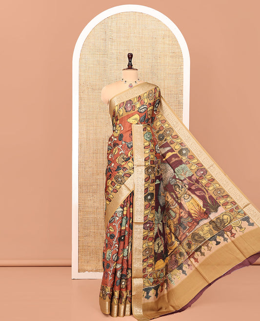 Brown Kalamkari Saree, Elevated with Floral Print, Complemented by Contrast Zari Border, Pallu of Lord Krishna Motifs, and a Contrast Blouse