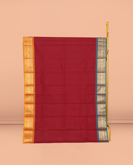 Red Plain Chettinad Cotton Saree, Complemented by a Contrast Traditional Zari Design Woven Ganga-Jamuna Border, Pallu of Stripes, and Paired with a Matching Blouse