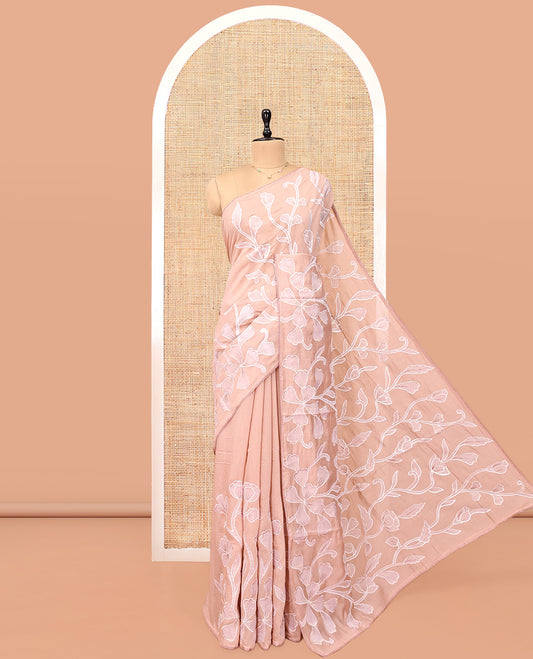 Pale Peach Organza Saree, Adorned with Floral Vine Design, a Lace Border, and a Matching Blouse