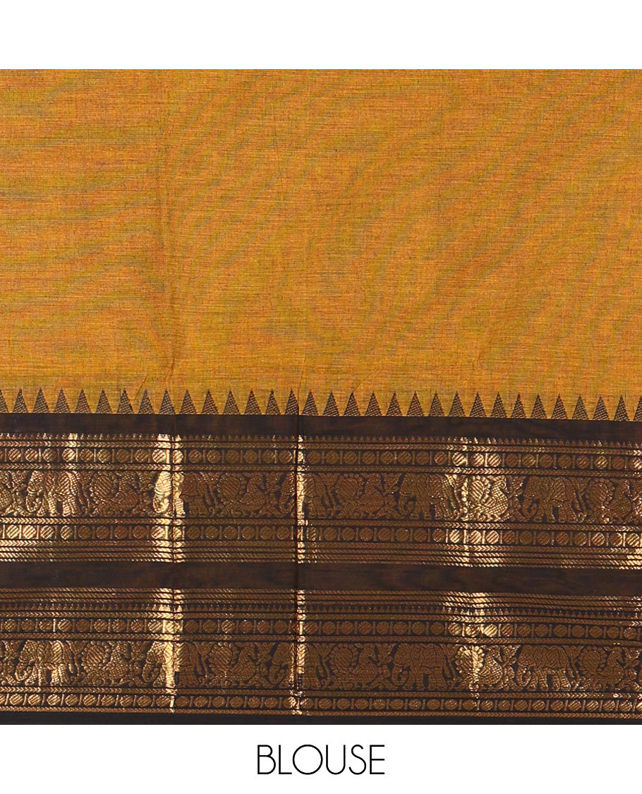 Mustard Plain Chettinad Cotton Saree, Complemented by a Contrast Rettai Pettu Temple Bright Gold Zari Border of Coin, Elephant, and Peacock Designs, Subtly Striped Pallu, and Paired with a Matching Blouse