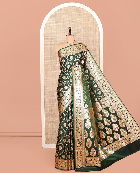 Green Banarasi Nylon Saree, Gleamed Up with Floral Jaal Jacquard, Highlighted by Traditional Zari Border, Intricate Pallu, and a Matching Blouse
