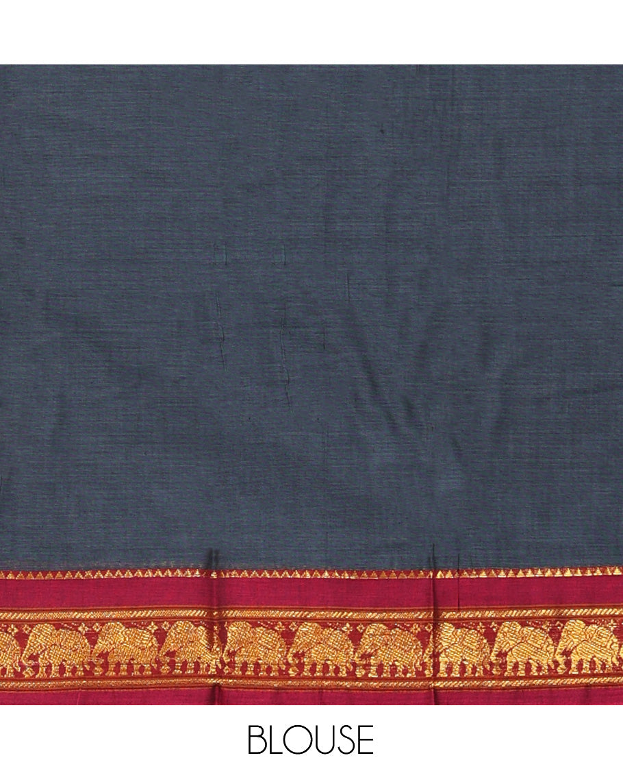 Grey Cotton Half-Saree Features Plain Skirt, a Contrast Elephant Border, a Matching Blouse, and a Contrast Dhavani