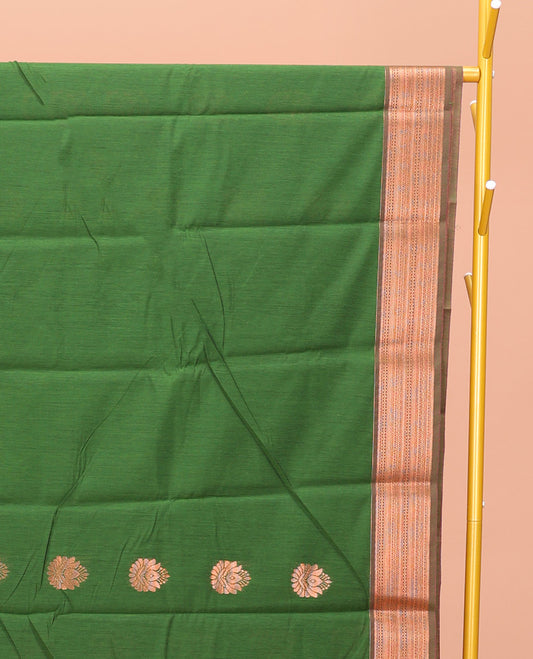 Green Semi-Silk Cotton Saree, Bedecked with Zari Buttas All Over Its Body, Highlighted by a Traditional Zari Border, Pallu of Paisley Designs, and Paired with a Matching Blouse