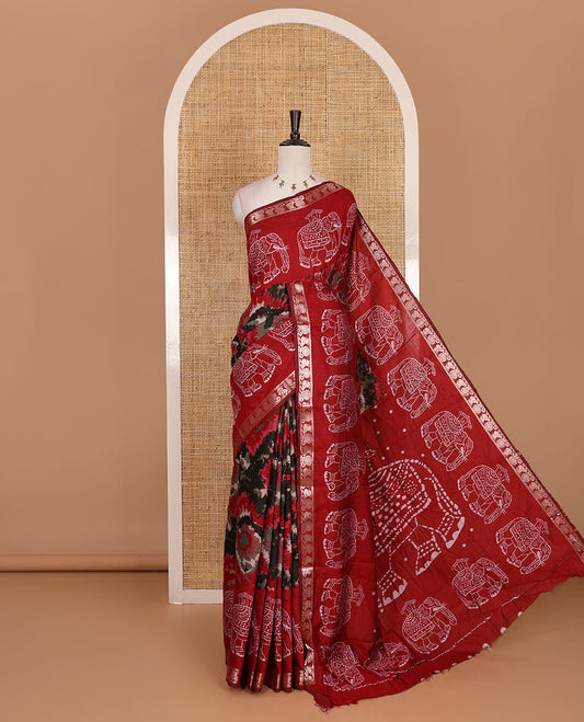 Red-black shibori printed muslin cotton saree, contrast batik elephant print border of zari annam, batik elephant pallu, and contrast polka dots print blouse