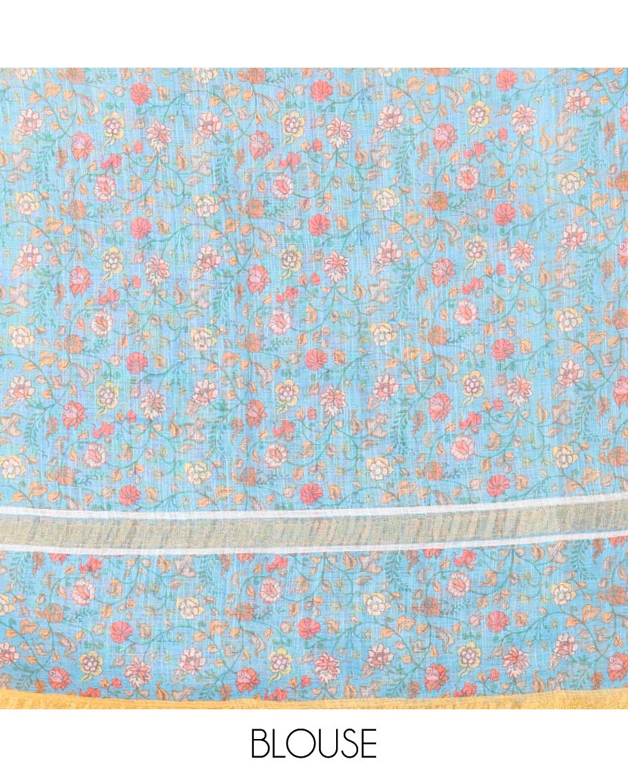 Yellow Linen Saree Detailed with Leaf Motifs All Over Its Body, Complemented by a Contrast Floral Vine Printed Border, Pallu Mirrors the Floral Vine Print, and Paired with a  Contrast Floral Printed Blouse