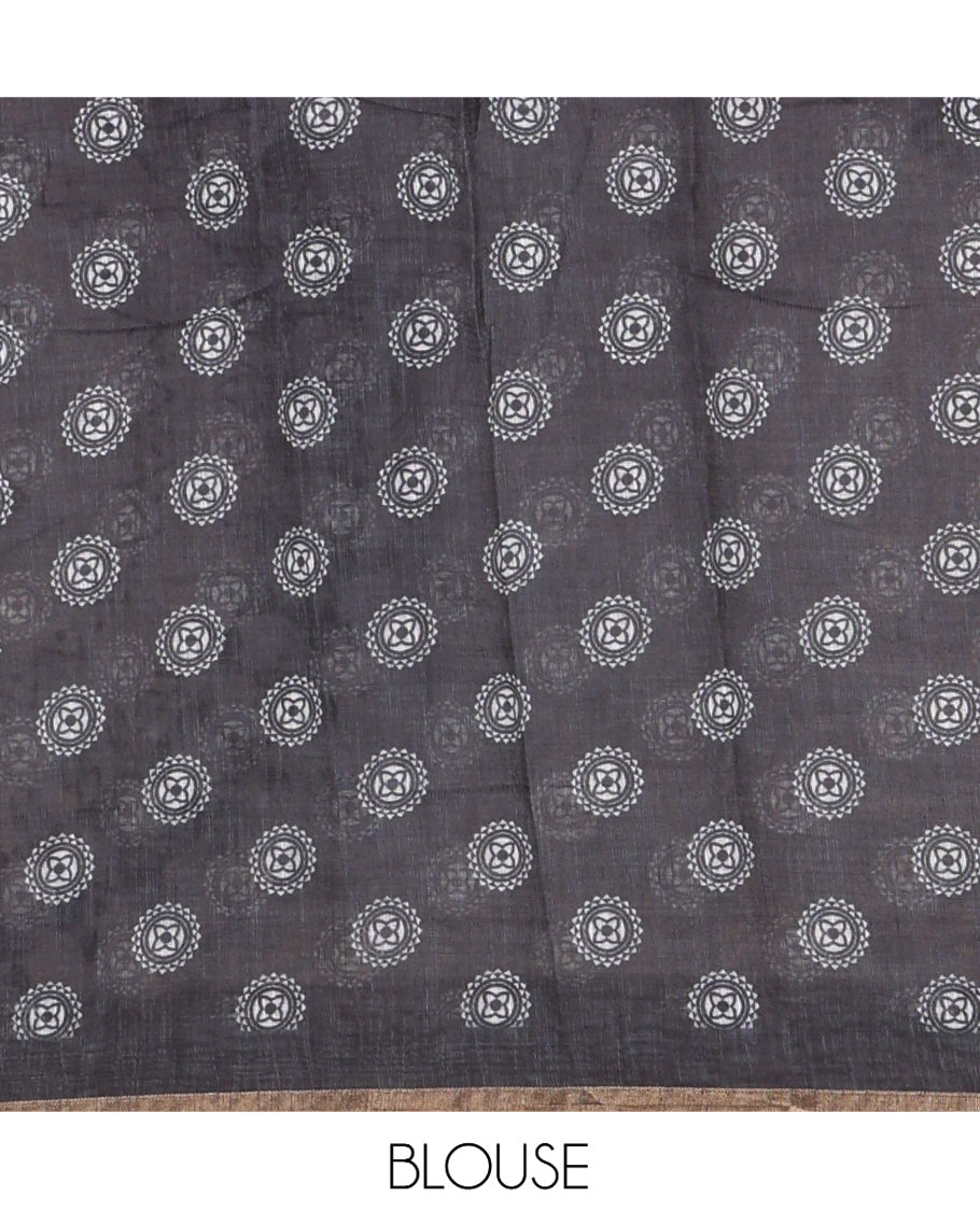 White Linen Cotton Saree Features Warli Print, a Contrast Piping Border, a Floral-Printed Pallu, and a Contrast Blouse