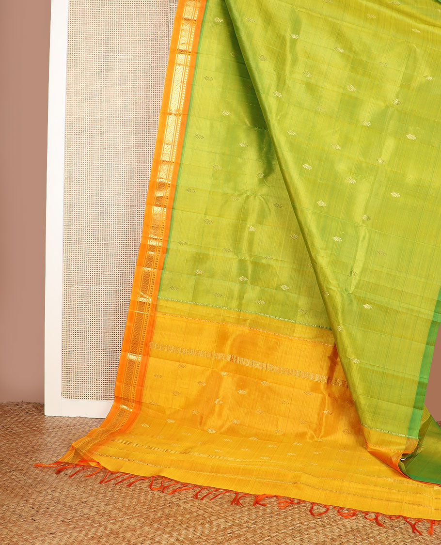 Green zari buttas Kanchipuram silk saree, contrast one-sided border of paneer sombu,banaras & jaal & zari design pallu