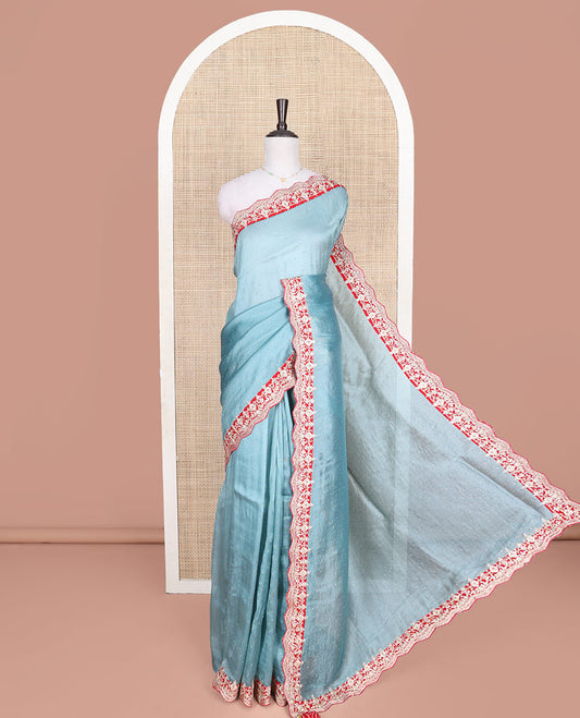 Blue Designer Saree, Gleamed with Stone Work Across Its Body, Complemented by a Contrast Scallop Patch-Embroidered Border, a Self Pallu, and Paired with Matching Blouse Featuring Embroidery and Bandhani Dots