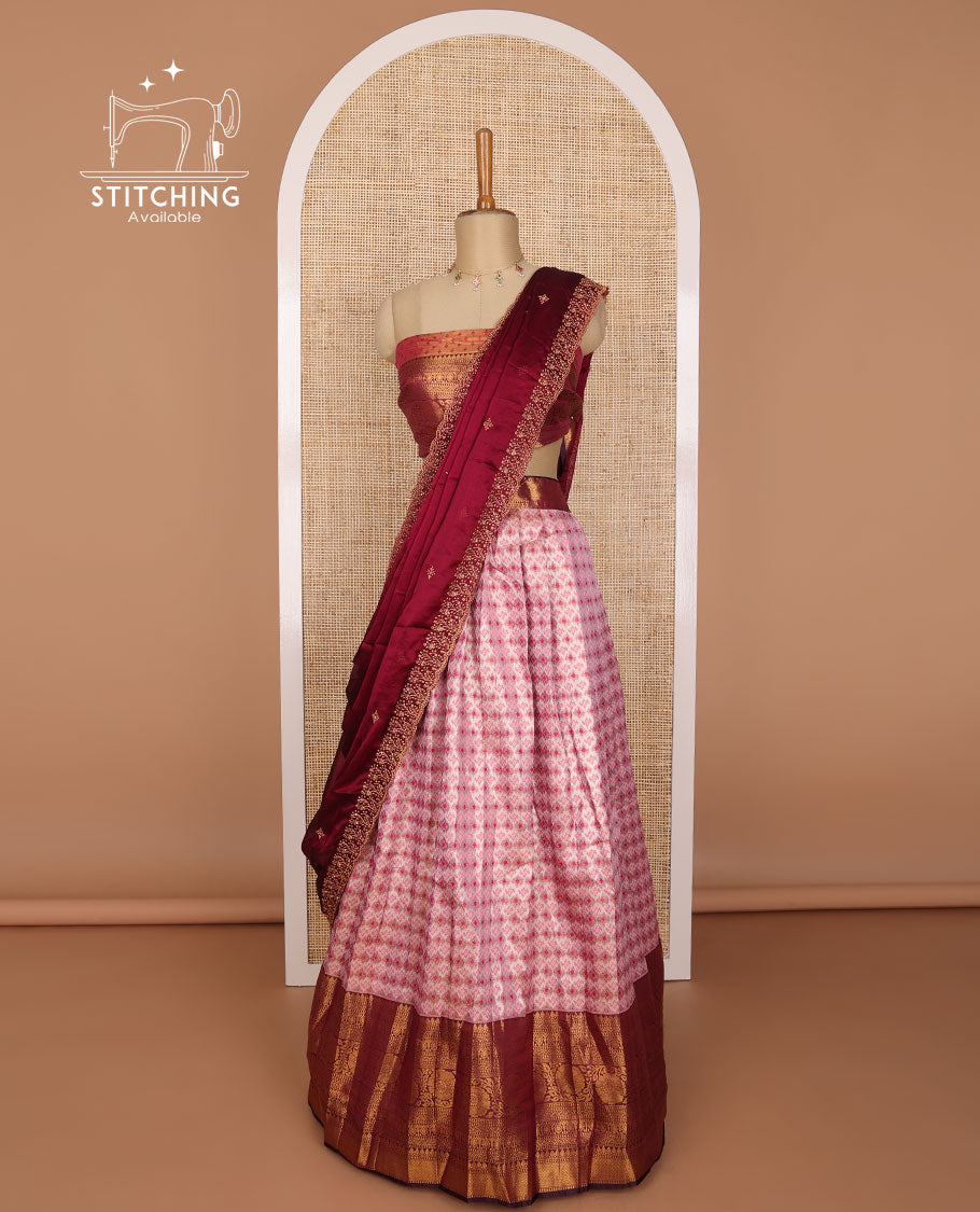 Light pink geometric design banaras half saree with contrast zari design border, floral design blouse & floral embroidery, scallop border dhavani
