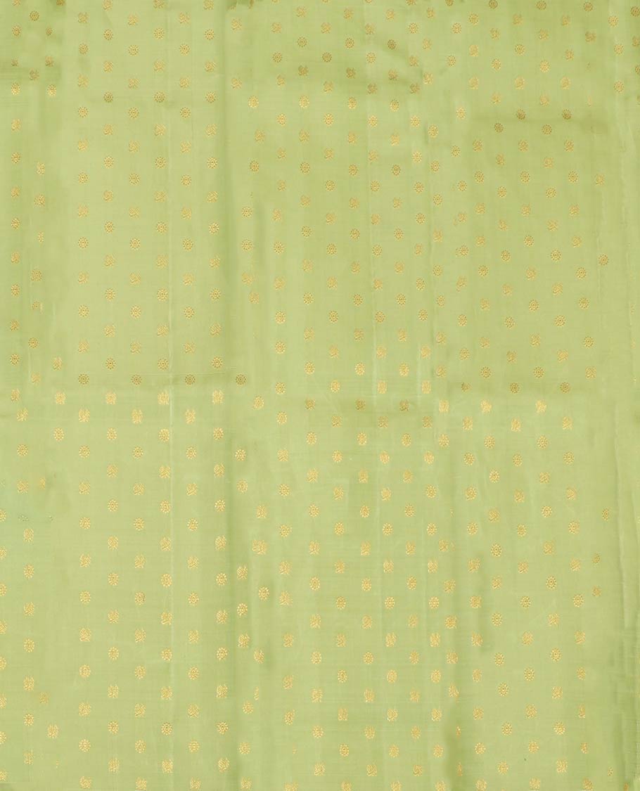 Green Pure Silk Half-Saree, Artfully Detailed with Mayil-Chakram Buttas on Its Skirt, Complemented by a Contrast Border of Rekku, Muthu, Diamond, Chakram, and Jaal Designs, Comes with a Contrast Blouse and a Dhavani of Jacquard Design