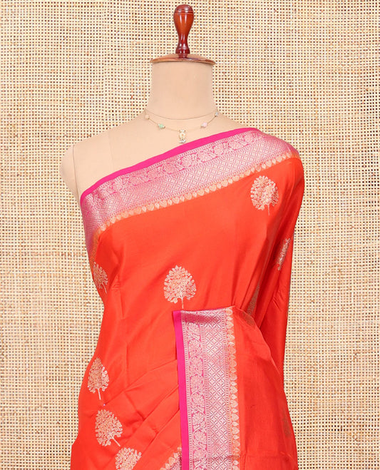 Orange Satin Silk Saree, Embellished with Tree Buttas All Over Its Body, Complemented by a Contrast Traditional Zari Design Border, Intricately Designed Pallu, and Paired with a Contrast Blouse
