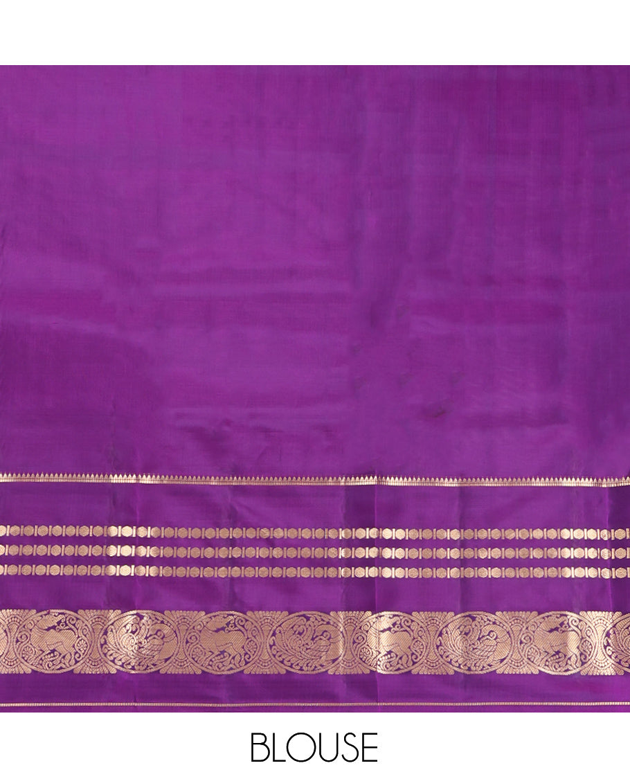 Green Vasundhara Lite-Silk Mix Saree Featuring Zari Buttas, a Contrast Rekku Border of Rudraksham, Round Mayil, and Round Yaali Designs, Grand Pallu, and a Contrast Blouse