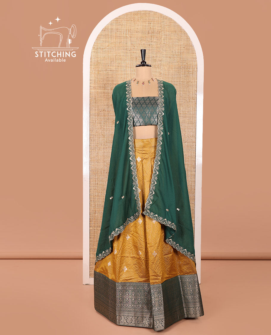 Yellow and Green Banaras Silk Half-Saree Featuring Zari Checks and Zari Buttas All Over the Skirt, Complemented by Contrast Traditional Zari Design Border, Paired with a Jacquard Blouse, and a Rangoli Georgette Dhavani of Embroidery and Scallop Border