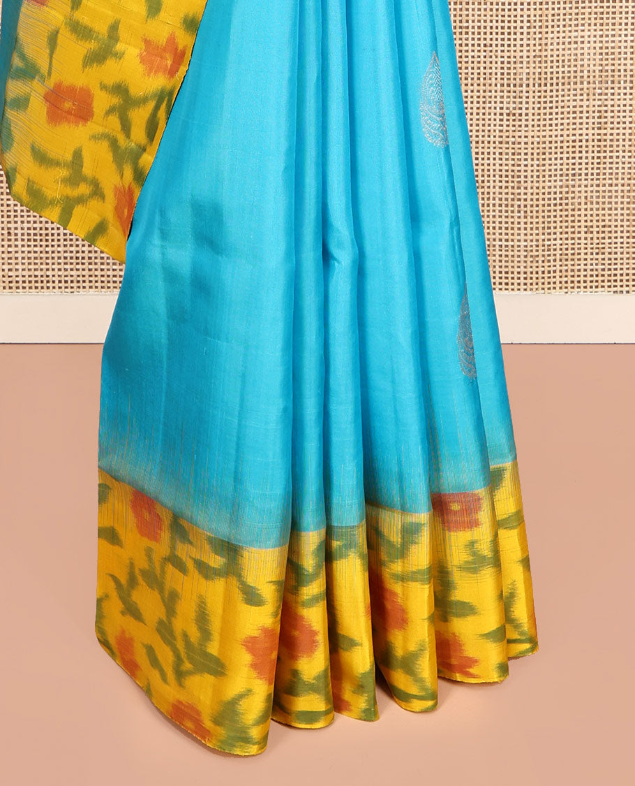 Blue Mayuri Soft Silk Saree, Elevated with Zari Buttas, Contrast Ikat Floral Border, and a Pallu Features Paisleys and a Contrast Blouse