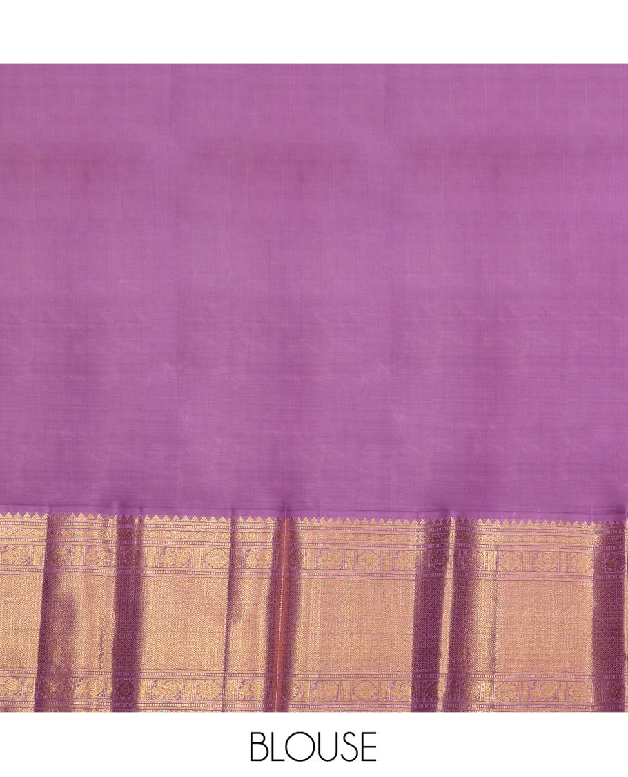Green Pure Silk Half-Saree, Artfully Detailed with Mayil-Chakram Buttas on Its Skirt, Complemented by a Contrast Border of Rekku, Muthu, Diamond, Chakram, and Jaal Designs, Comes with a Contrast Blouse and a Dhavani of Jacquard Design
