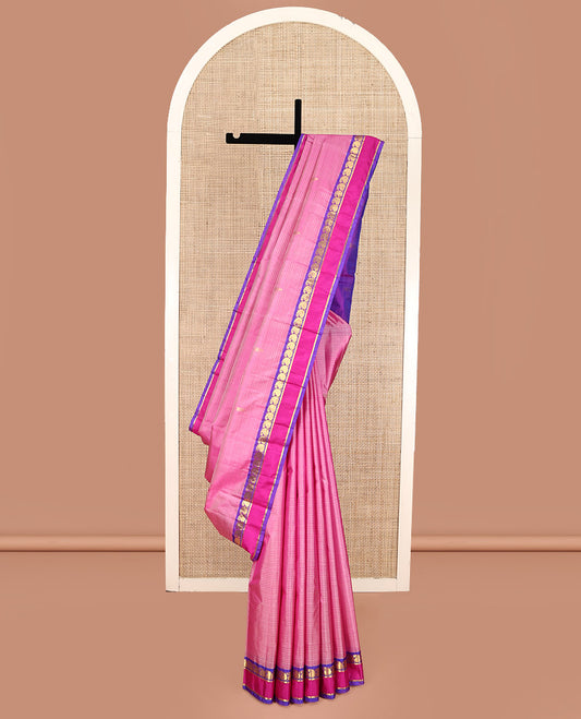 Pink Kanchipuram Silk Saree, Sparsely Woven with Vazhaipoo Stripes and Zari Buttas on Its Body, Complemented by Contrast Rettai Pettu Border of Kathir, and Vanki Manga Designs, Zari-Striped Pallu, and Paired with a Contrast Blouse